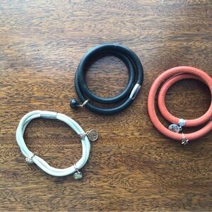 Set of Three Leather Wrap Bracelets With Charms